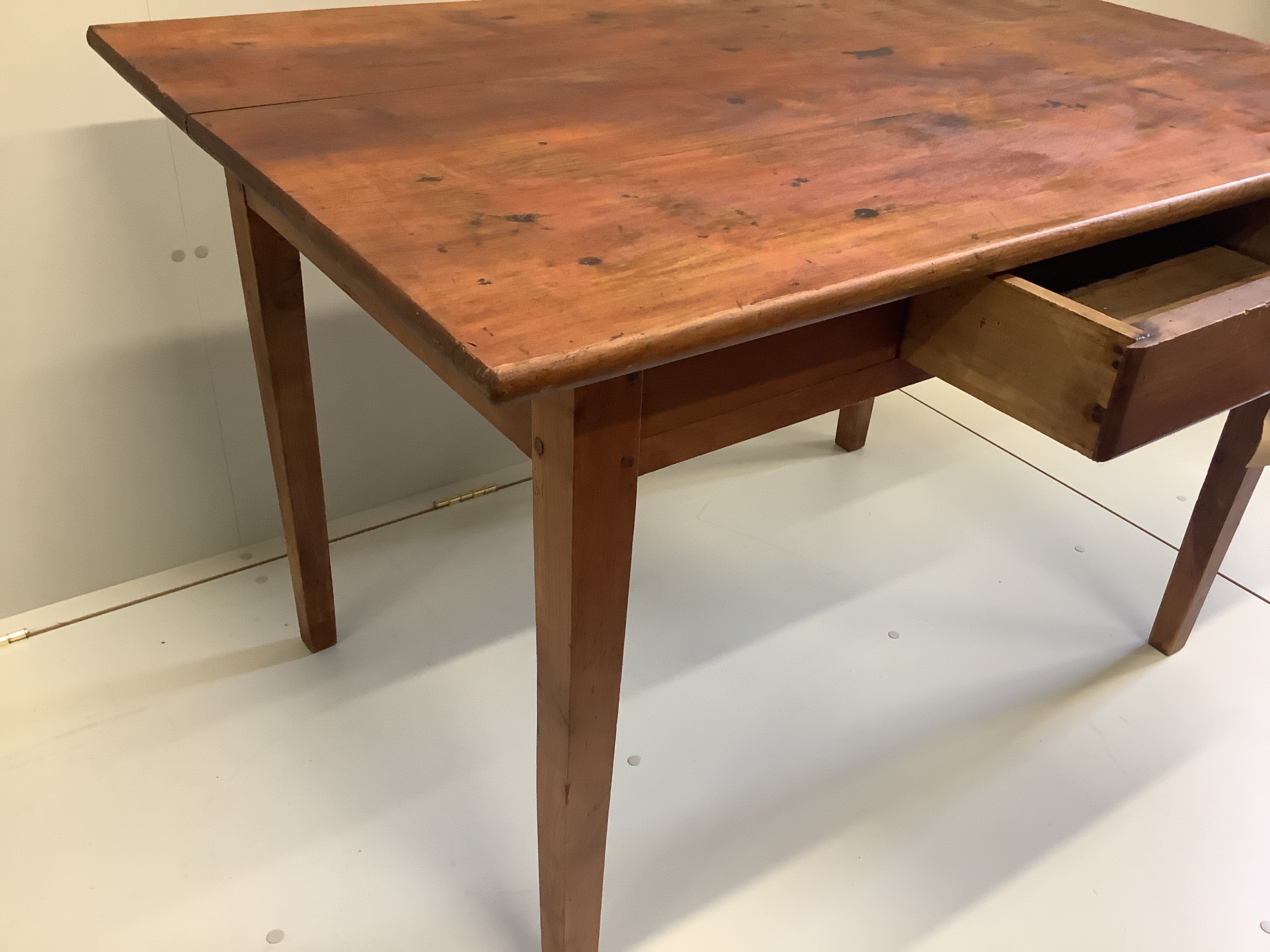 A 19th century French rectangular fruitwood kitchen table, width 120cm, depth 80cm, height 75cm